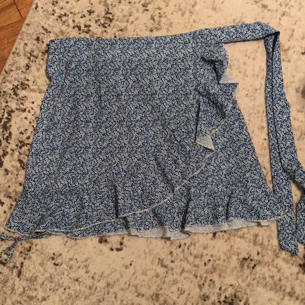 Blue floral wrap skirt. Never worn.